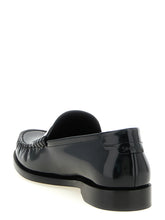 Saint Laurent Black Calfskin Slip On Loafers - Detail view