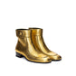 Saint Laurent Gold Leather Ankle Boots - Side view